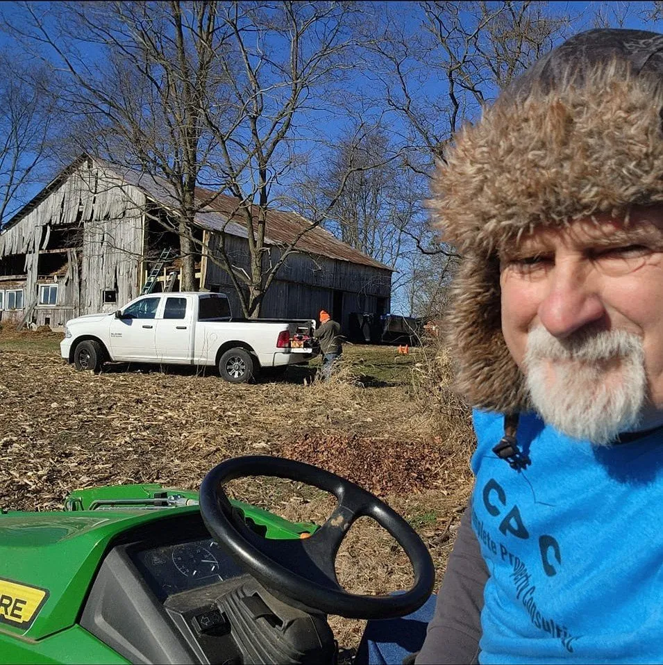 Slide of The Barn Guys