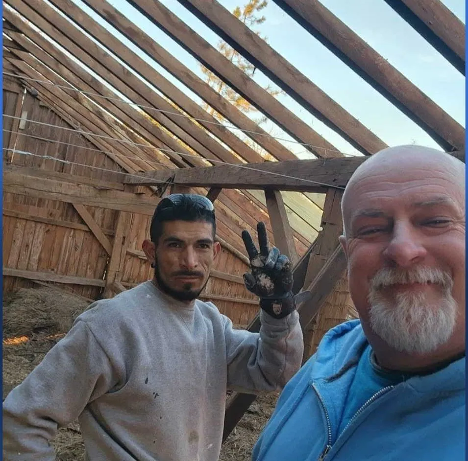 Slide of The Barn Guys