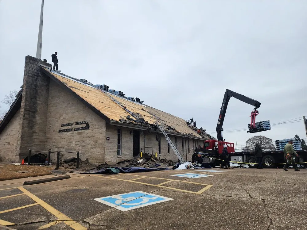 Slide of The Barn Guys