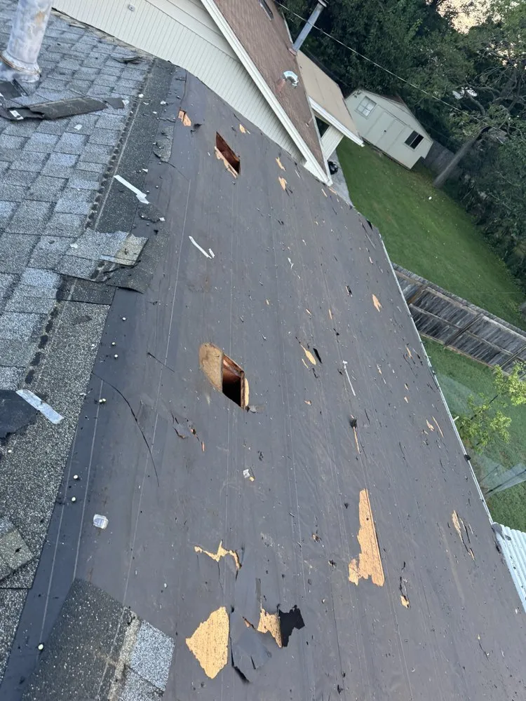 Slide of The Best Roofing Company