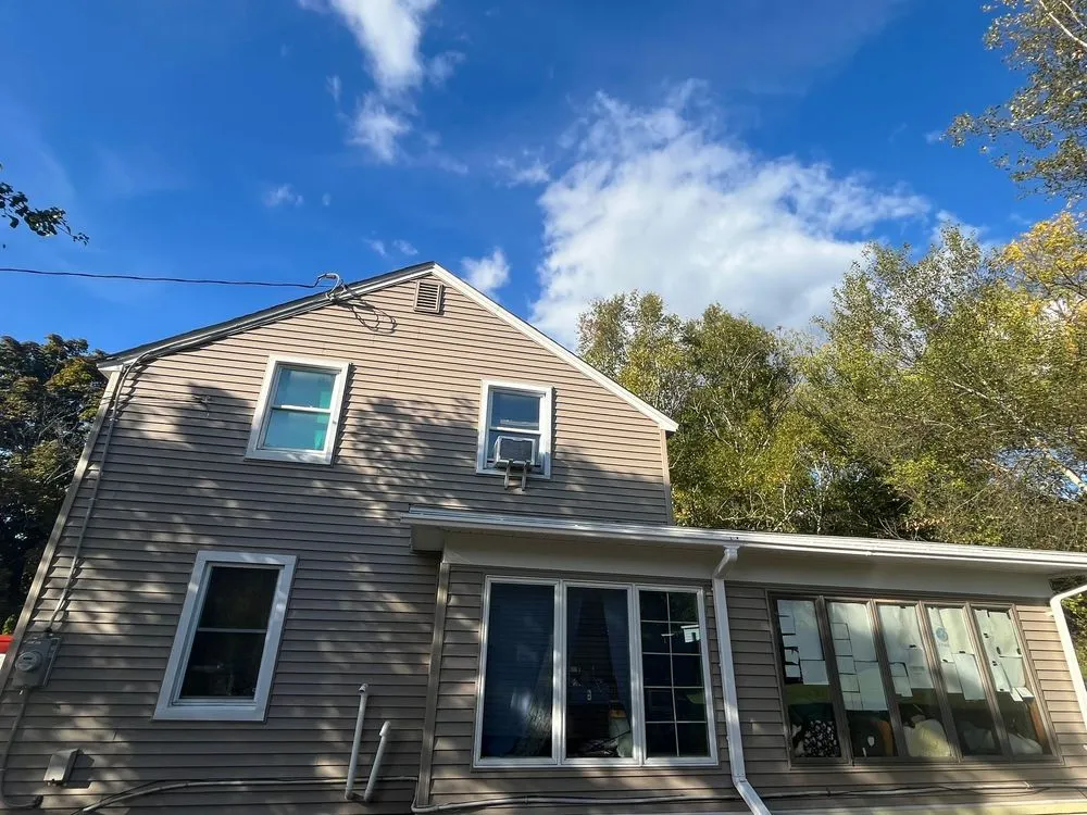 Slide of The Black Goat Roofing And Siding