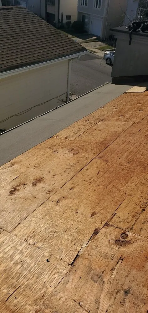 Slide of The Budget Roofing Company