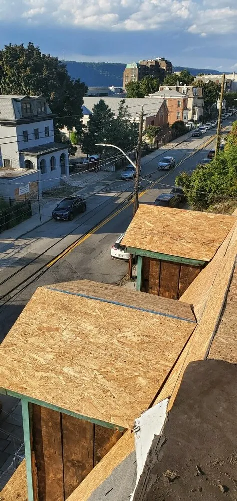 Slide of The Budget Roofing Company