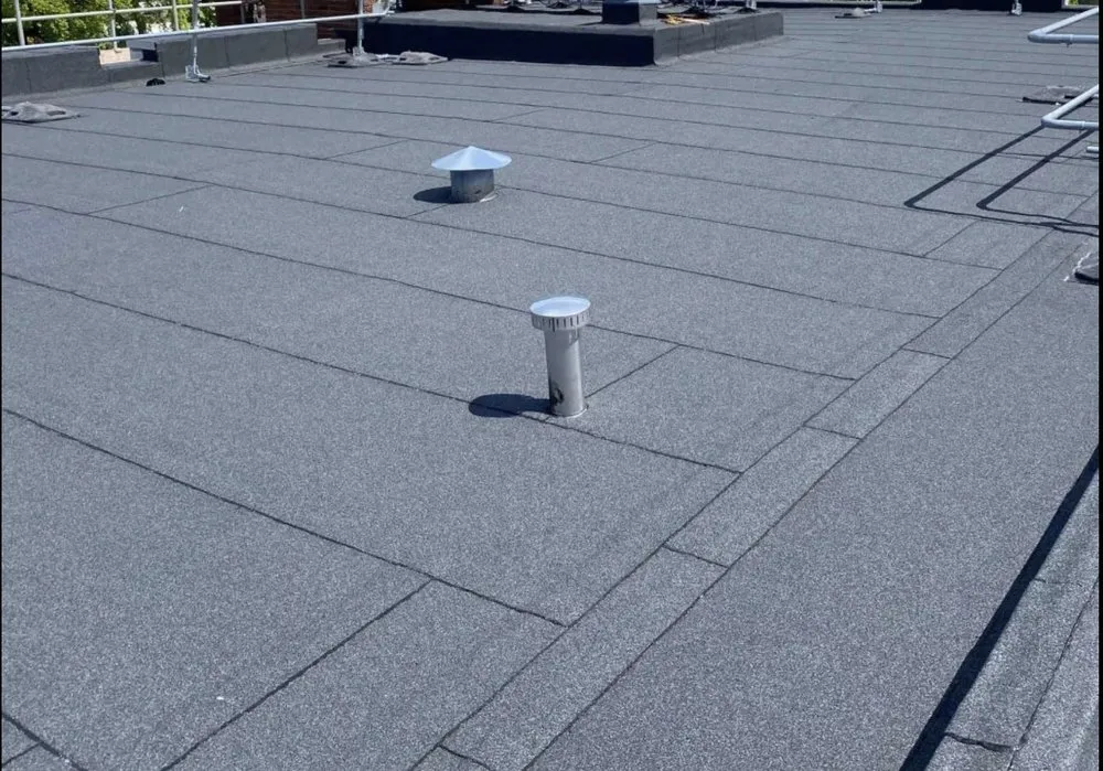 Slide of The Budget Roofing Company