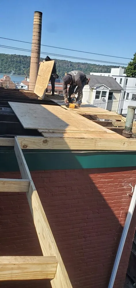 Slide of The Budget Roofing Company