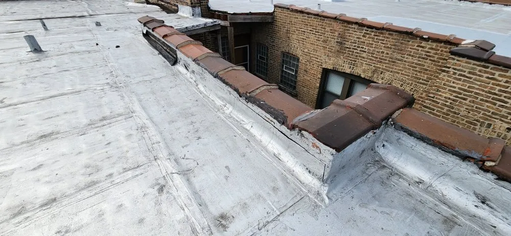 Slide of The Flat Roof Specialist