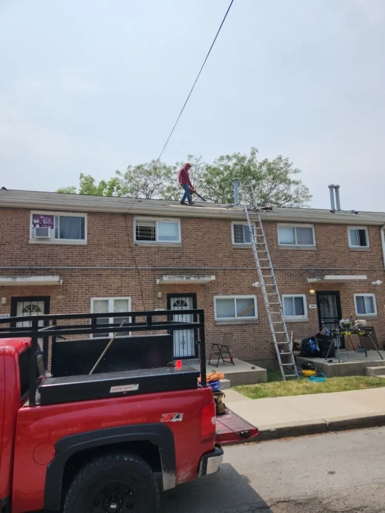 Slide of The Flat Roof Specialist