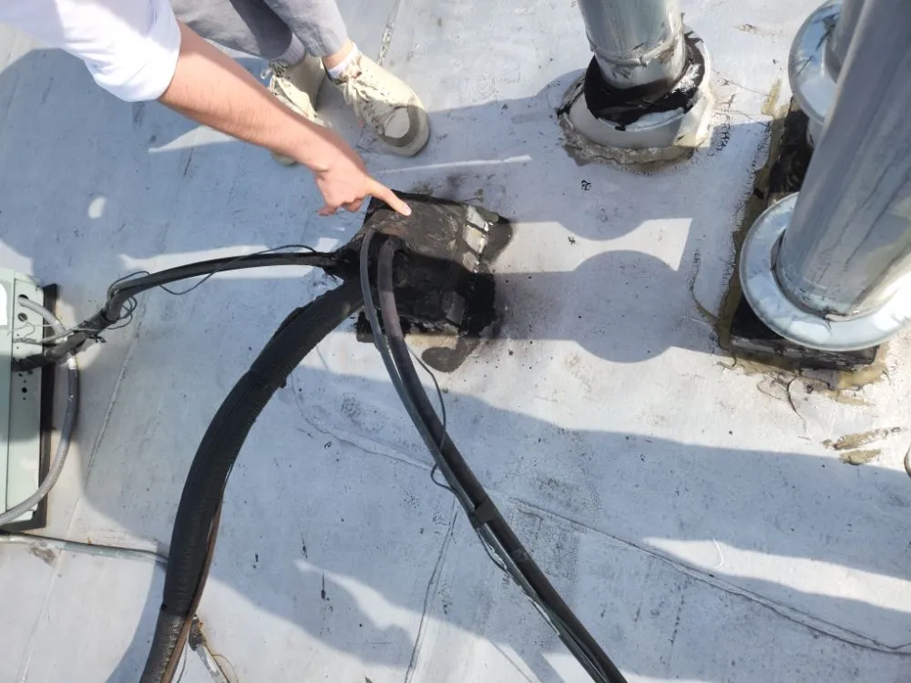 Slide of The Flat Roof Specialist