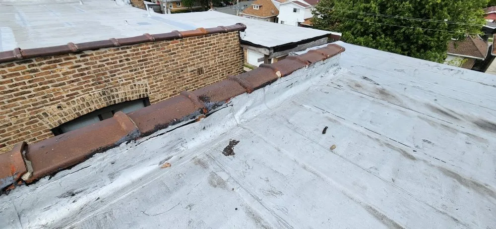 Slide of The Flat Roof Specialist