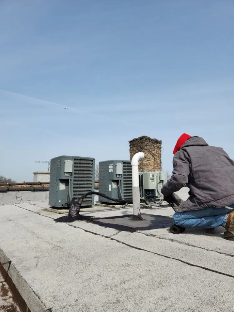 Slide of The Flat Roof Specialist