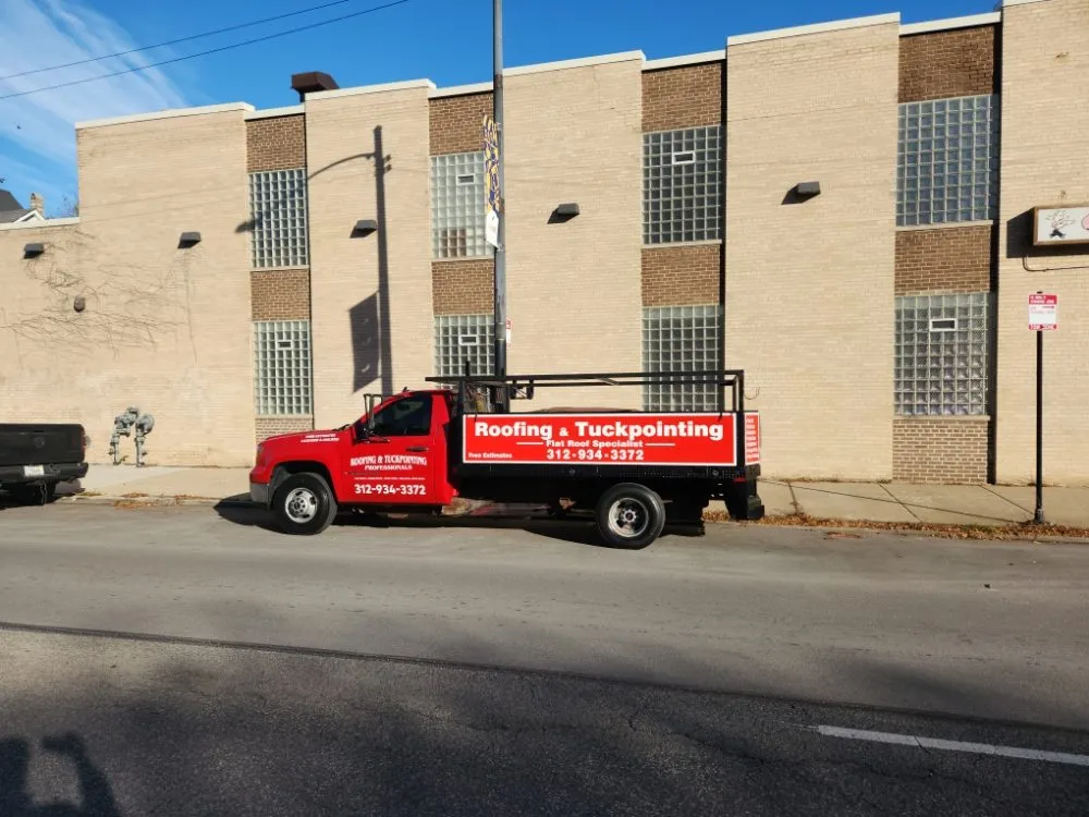 Slide of The Flat Roof Specialist