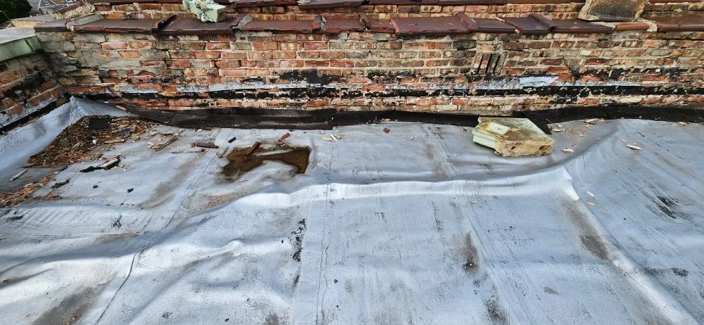 Slide of The Flat Roof Specialist