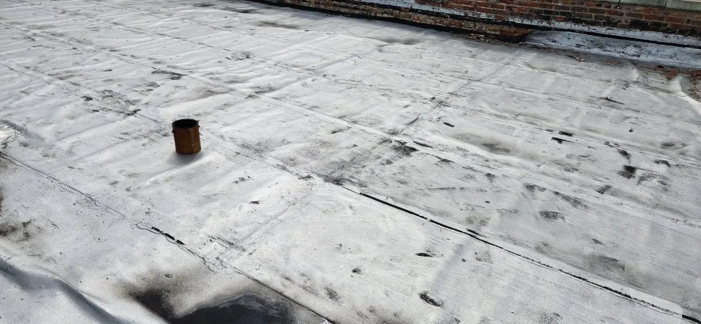 Slide of The Flat Roof Specialist