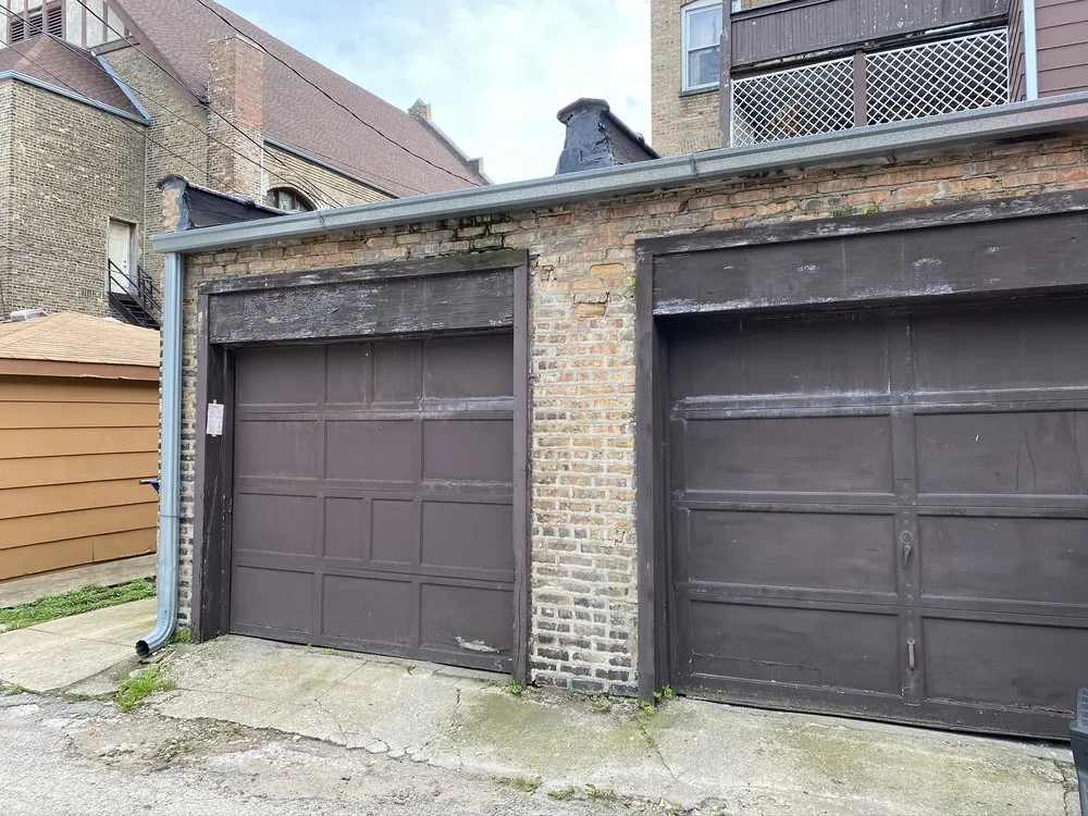 Slide of The Flat Roofing Specialist & Tuck Pointing Company