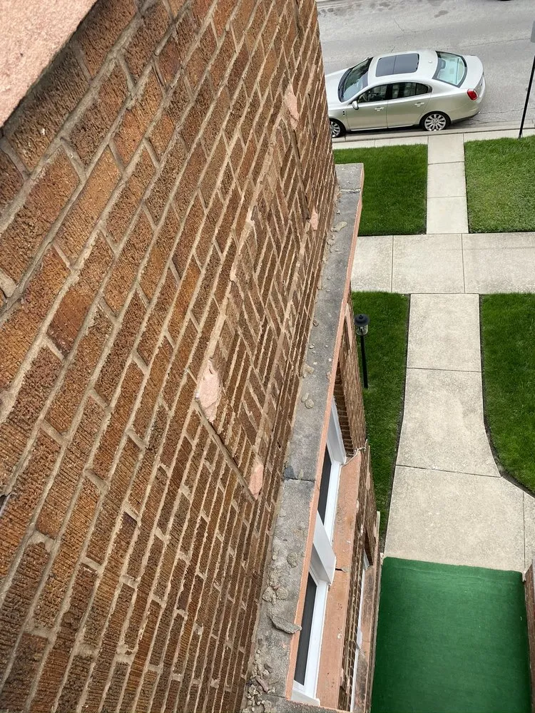 Slide of The Flat Roofing Specialist & Tuck Pointing Company