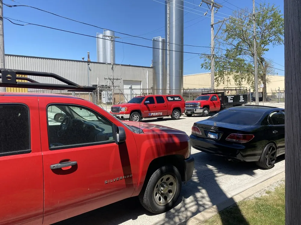 Slide of The Flat Roofing Specialist & Tuck Pointing Company