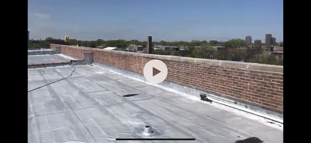 Slide of The Flat Roofing Specialist & Tuck Pointing Company