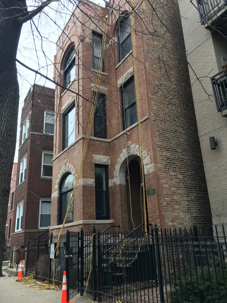 Slide of The Flat Roofing Specialist & Tuck Pointing Company