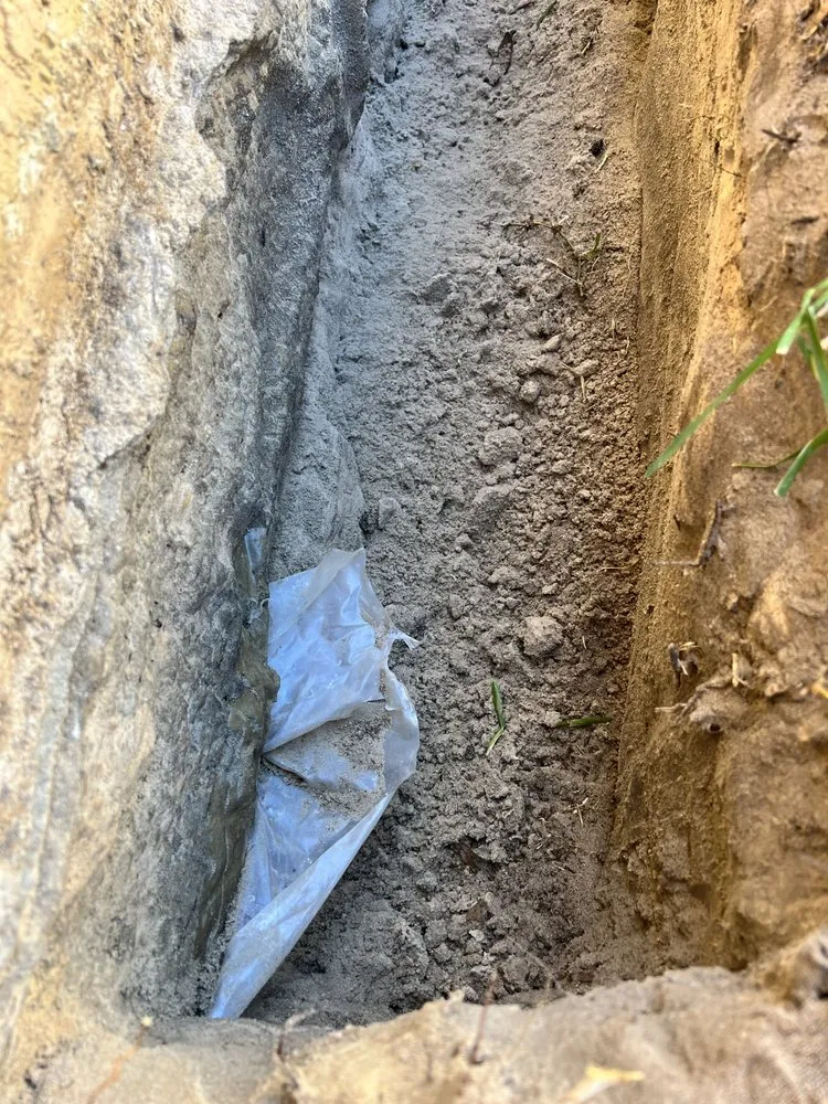 Slide of The French Drain Guys