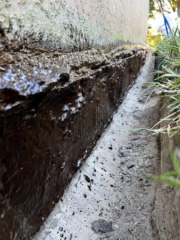 Slide of The French Drain Guys