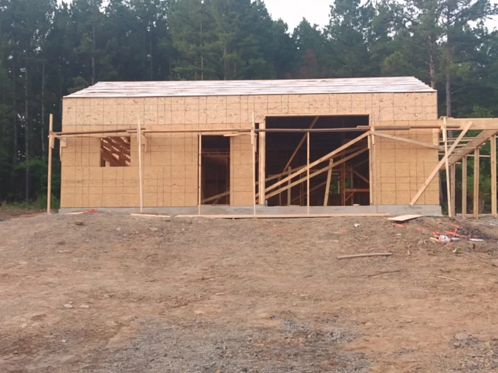 Top-rated flat roof repair in Howe, OK by The God Squad Construction