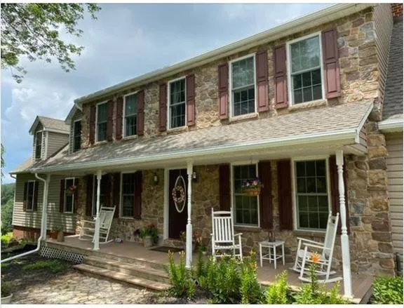 Slide of The Grace Family Roofing Company