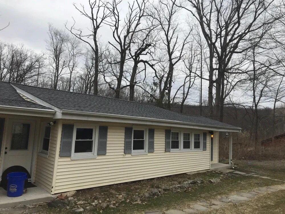 Slide of The Great American Roofing Company