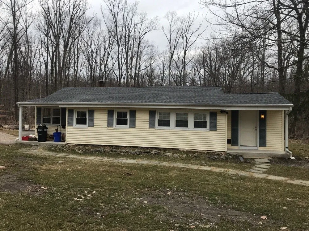 Slide of The Great American Roofing Company