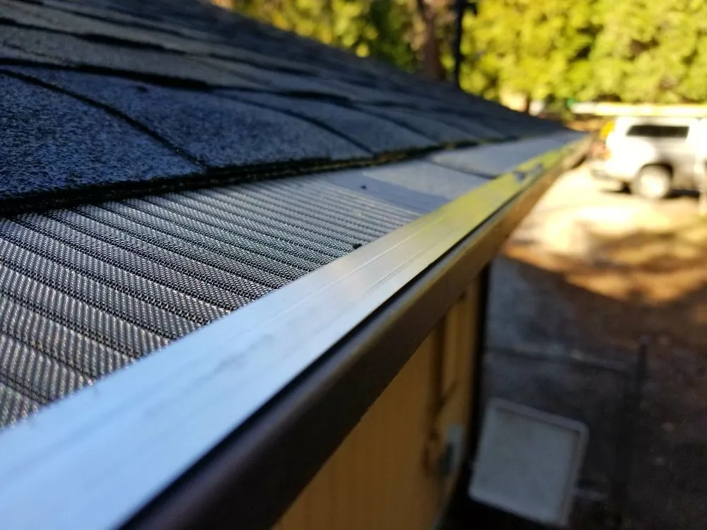 Slide of The Gutter Guard Specialist