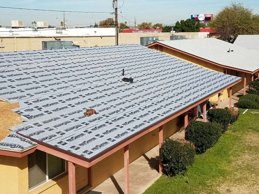 Slide of The Handy Roofer