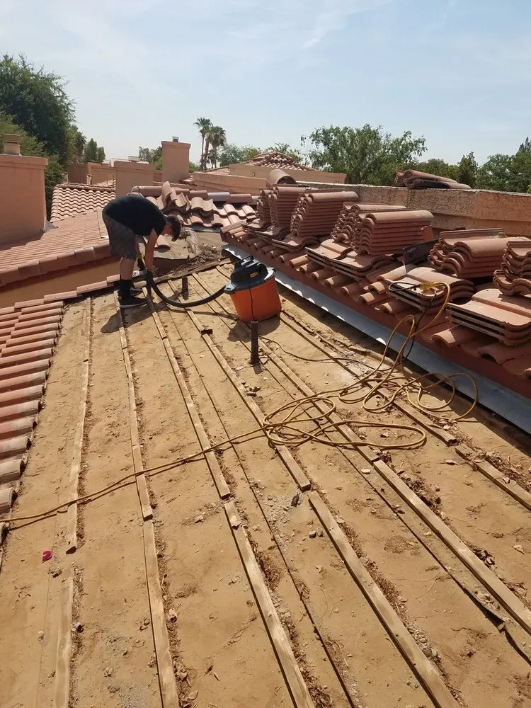 Slide of The Handy Roofer