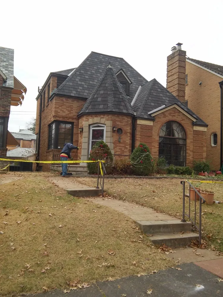 Professional roof installation experts serving St. Louis, MO - The Happy Roof Company