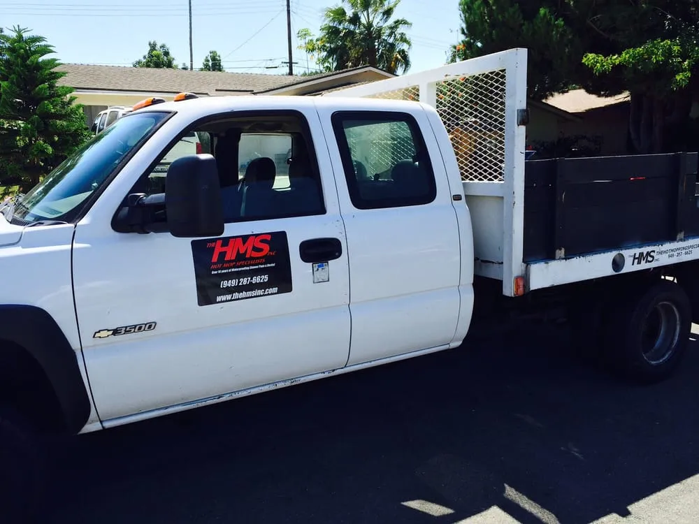 Slide of The Hot Mop Specialists