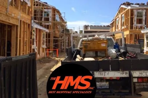 The Hot Mop Specialists Logo