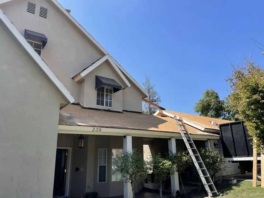 Slide of The Local Friendly Roofer
