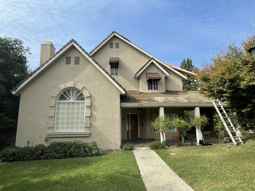 Slide of The Local Friendly Roofer