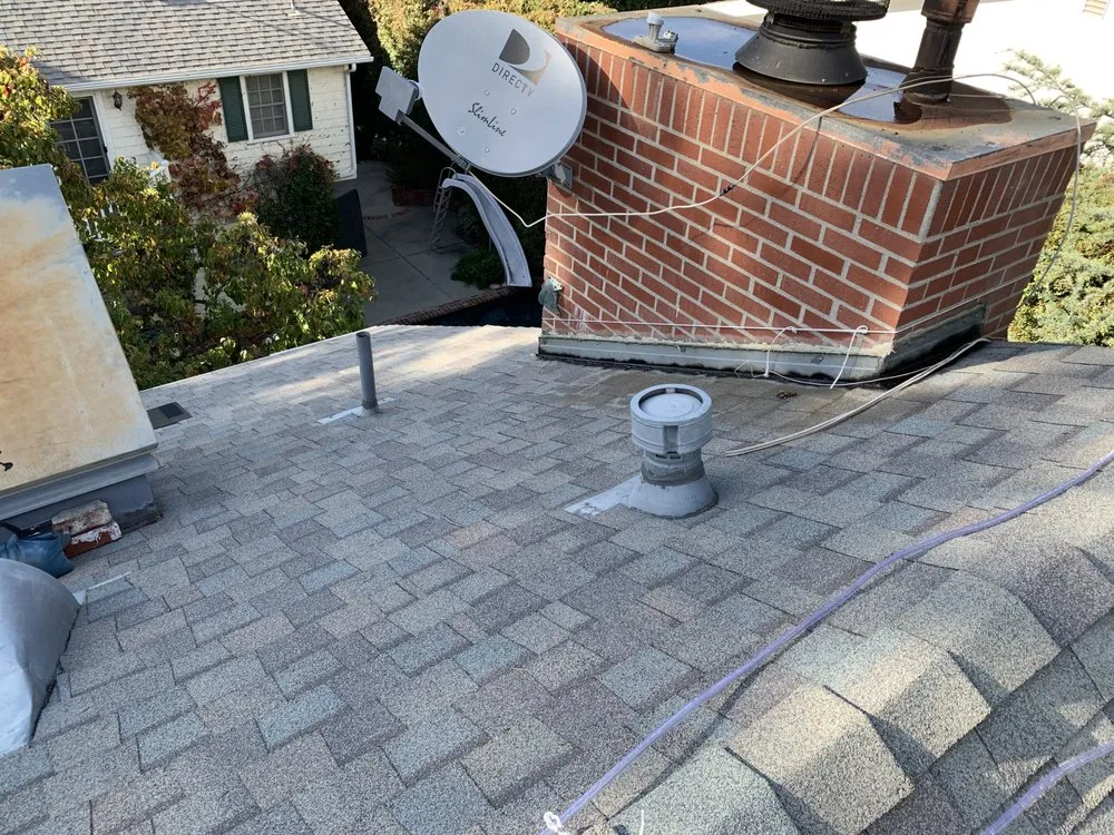 Slide of The Local Friendly Roofer