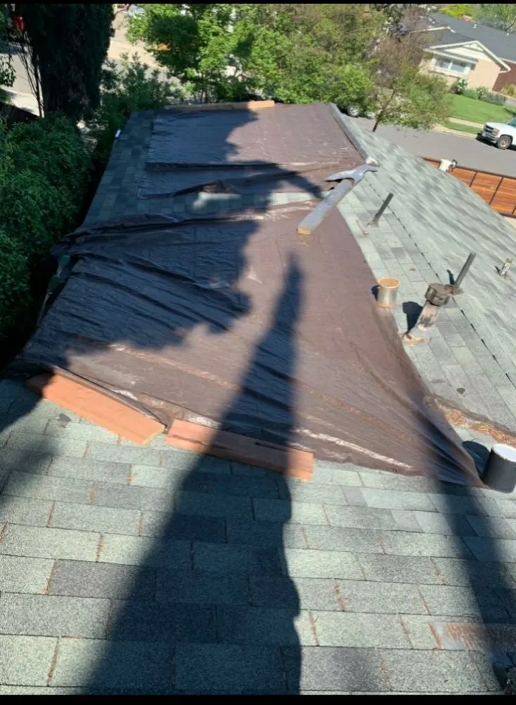 Slide of The Local Roofers and Builders