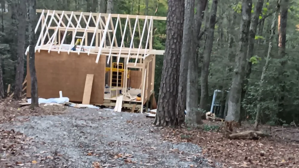 Slide of The Log Cabin Guys