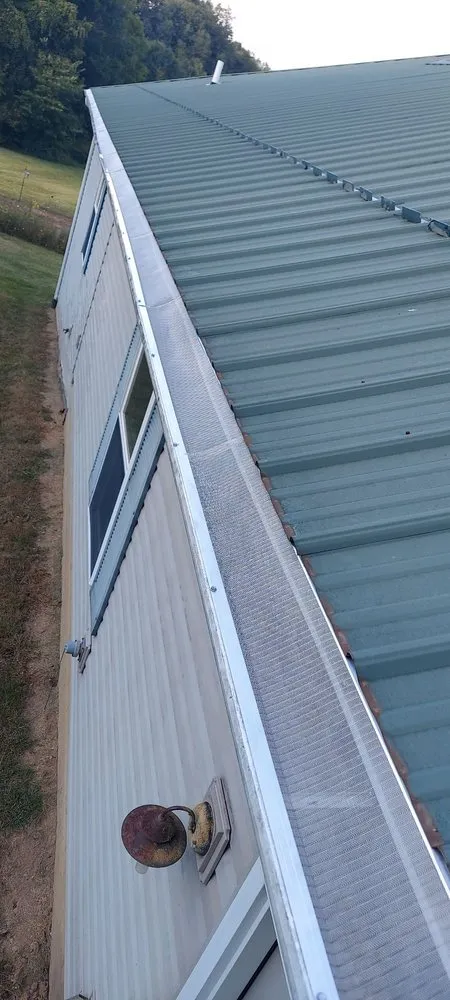 Slide of The Metal Roofing Company