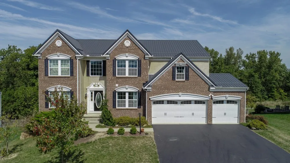 Slide of The Metal Roofing Company