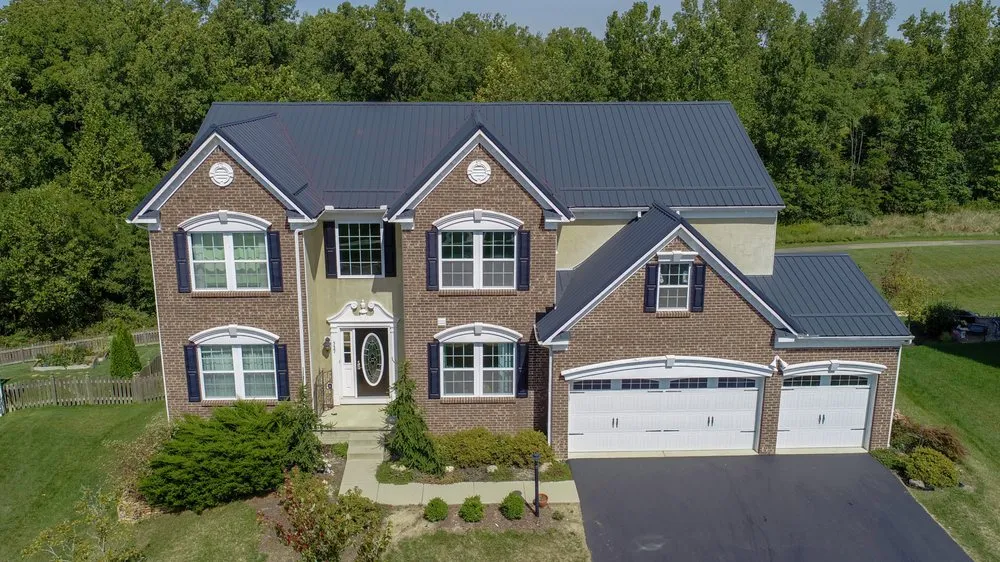 Slide of The Metal Roofing Company