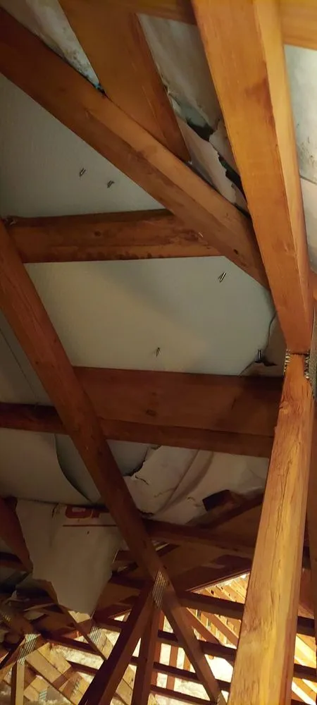 Slide of The Metal Roofing Company