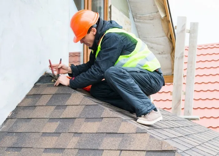 Top-rated storm damage roof repair for homes in Newton Center, MA by The Newton Roofers