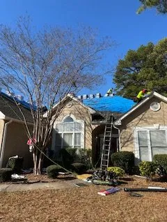 Slide of The Paris Roofing Company Too