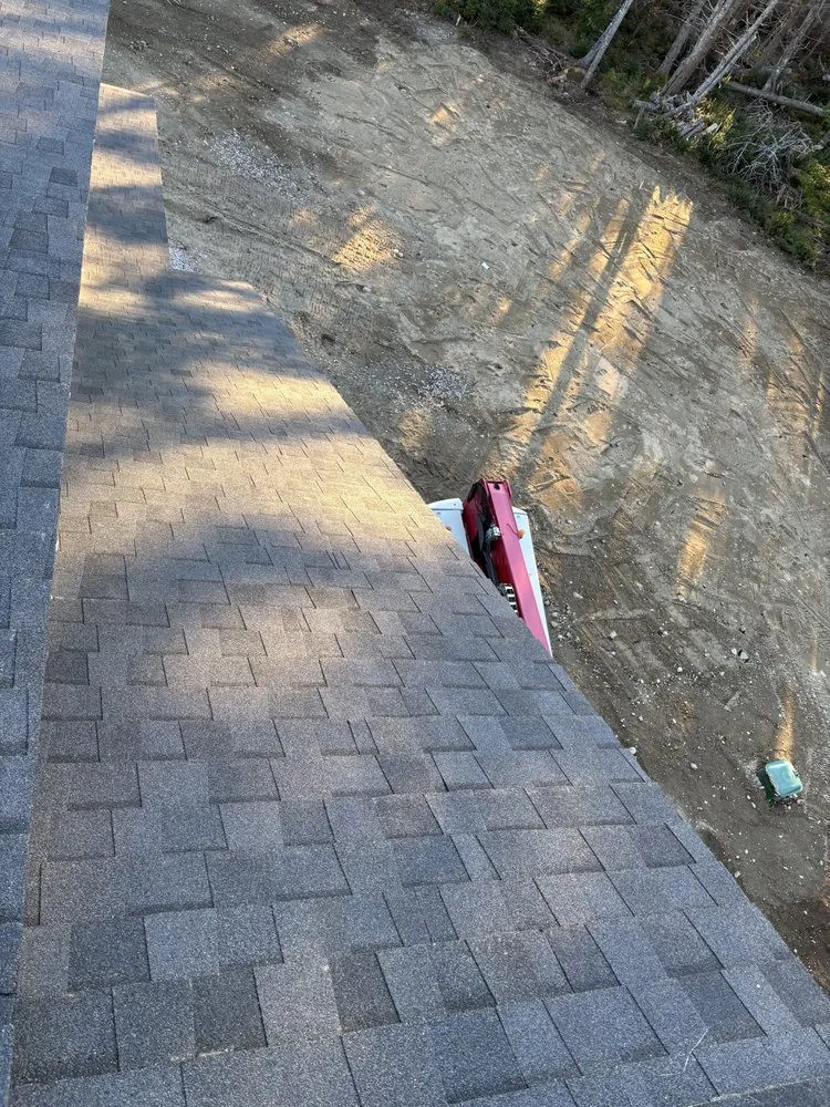 Slide of The Pioneer Roofing Company