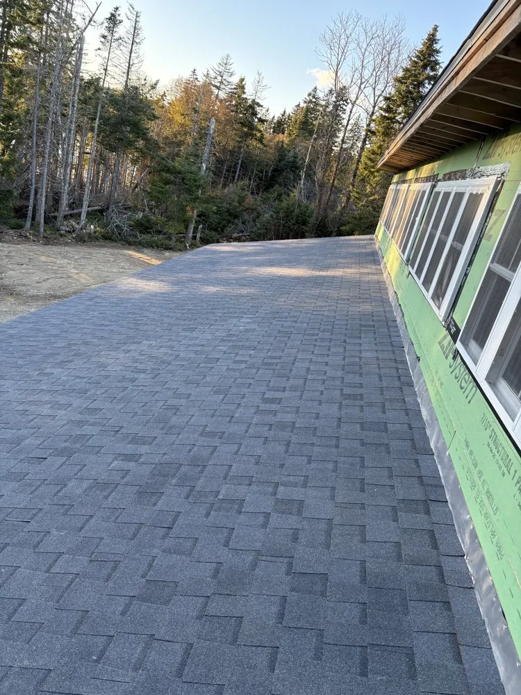 Slide of The Pioneer Roofing Company