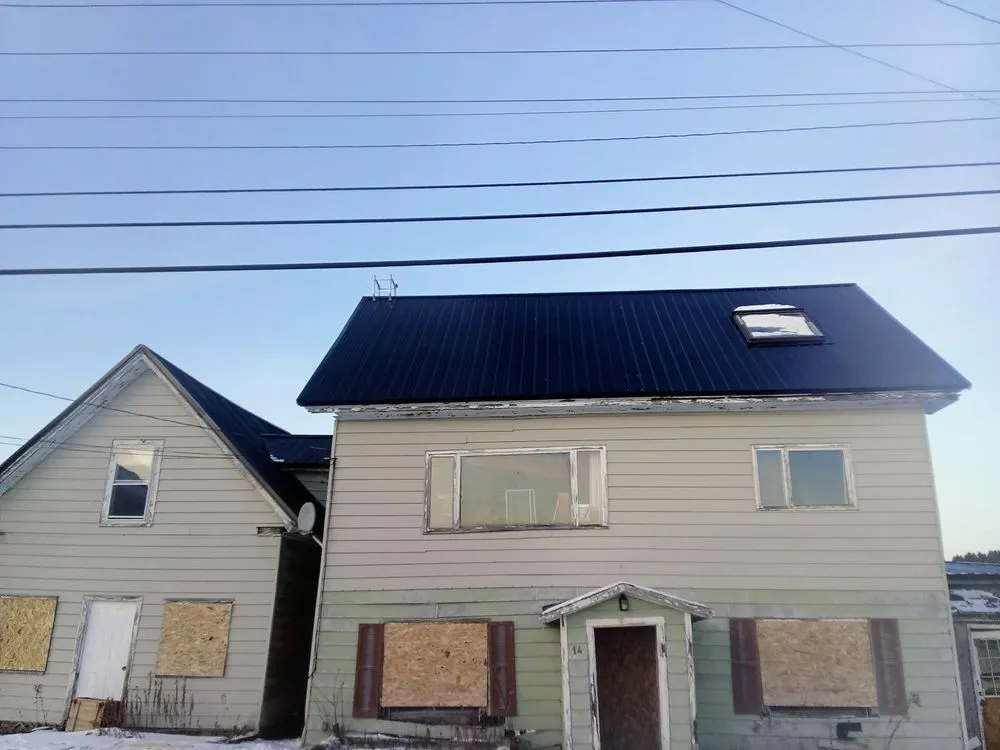 Slide of The Pioneer Roofing Company