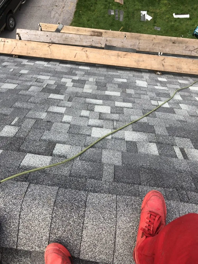 Slide of The Pioneer Roofing Company