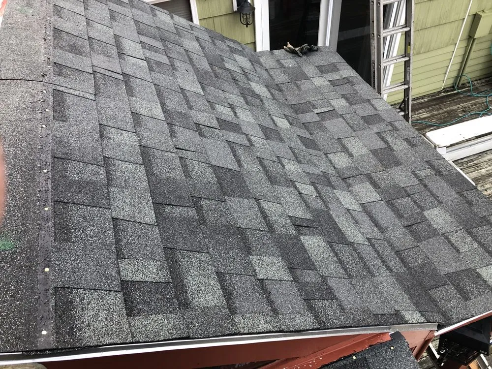 Slide of The Pioneer Roofing Company